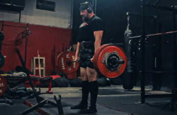 An old fat man trying to deadlift