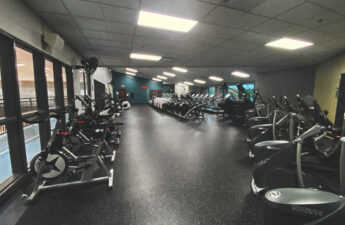 A room full of cardio equipment